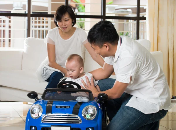 asian parents playing car