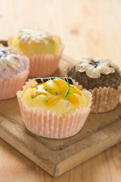 Cupcakes med mad baggrunde - Stock-foto