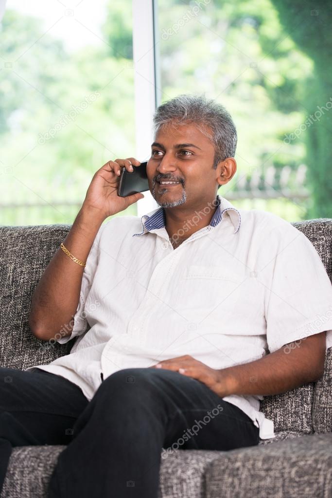Indian male on phone