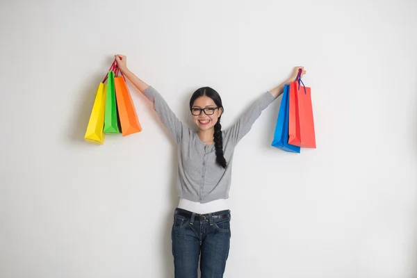 Asian woman with christmas gifts — Stock Photo, Image