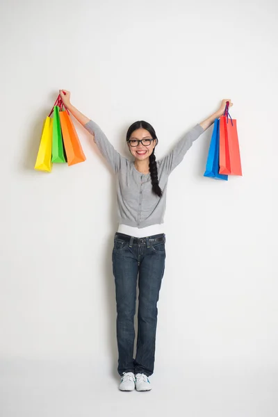 Chinese woman with christmas gifts — Stock Photo, Image