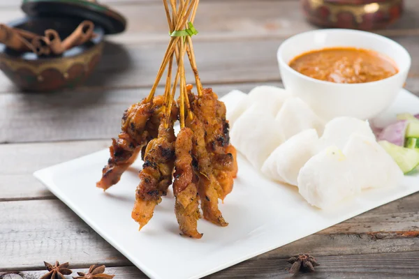 Satay with curry sauce — Stock Photo, Image