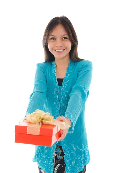 Malay girl holding a gift — Stock Photo, Image