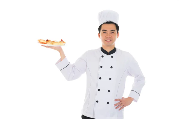 Chef chinês masculino segurando alimentos — Fotografia de Stock