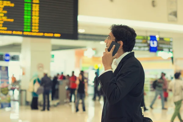 Indian business male with a phone — Stock Photo, Image