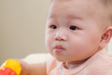 Asyalı bebek gülümseyen