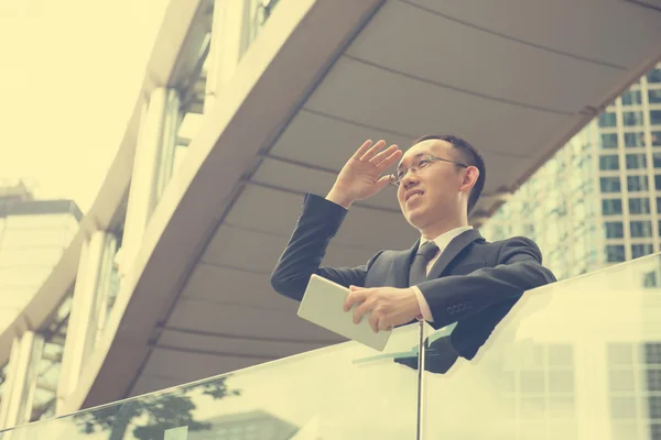 Chinese businessman with tablet computer — Stock Photo, Image