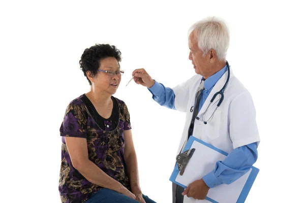 Asian   doctor with female patient — Stock Photo, Image