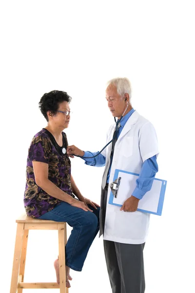 Asian   doctor with female patient — Stock Photo, Image