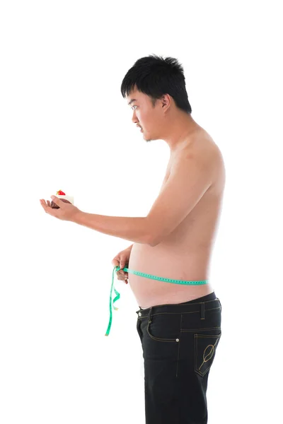 Asian man with measuring tape — Stock Photo, Image