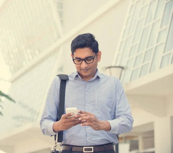 Indian businessman over on a phone — Stock Photo, Image