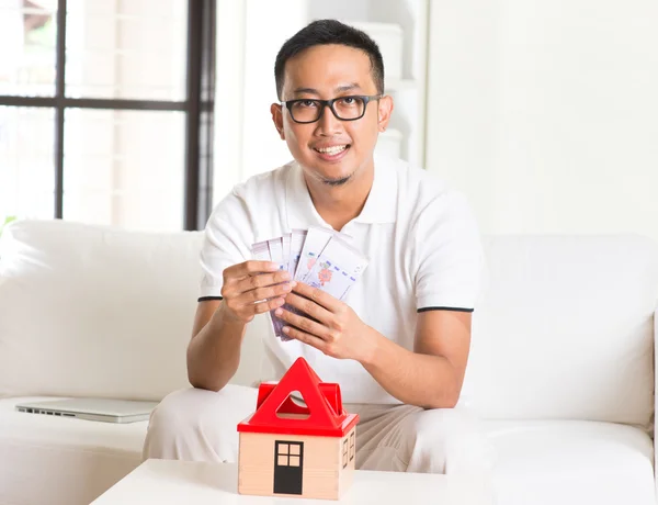 Asian male and house loan — Stock Photo, Image