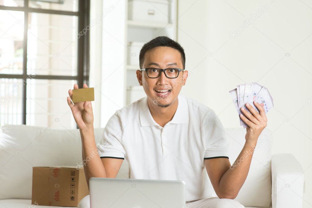 Man with cash and credit card