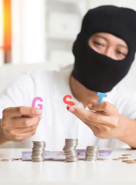 Man with GST letters — Stock Photo, Image