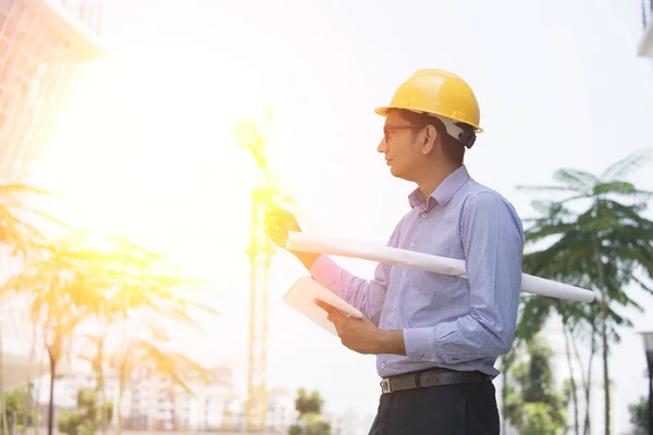 Indian engineer on construction background — Stock Photo, Image