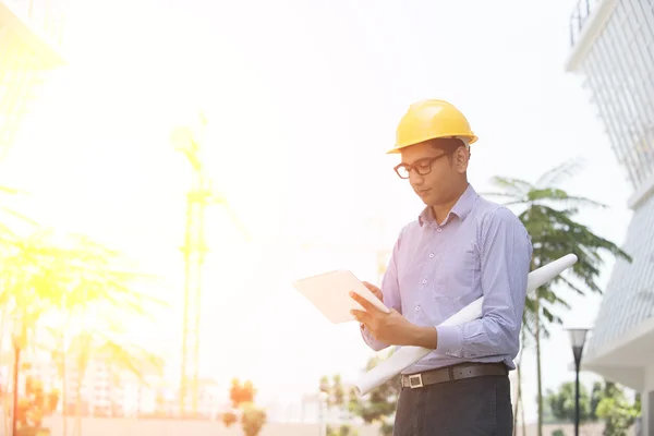 Indian engineer on construction background — Stock Photo, Image