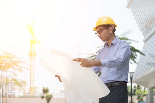 Indian engineer on construction background — Stock Photo, Image