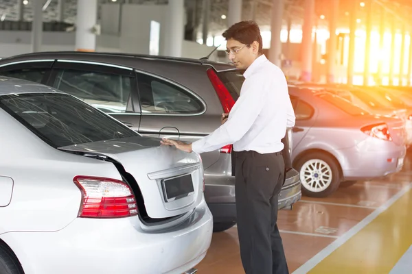 Indian business at car park — Stock Photo, Image