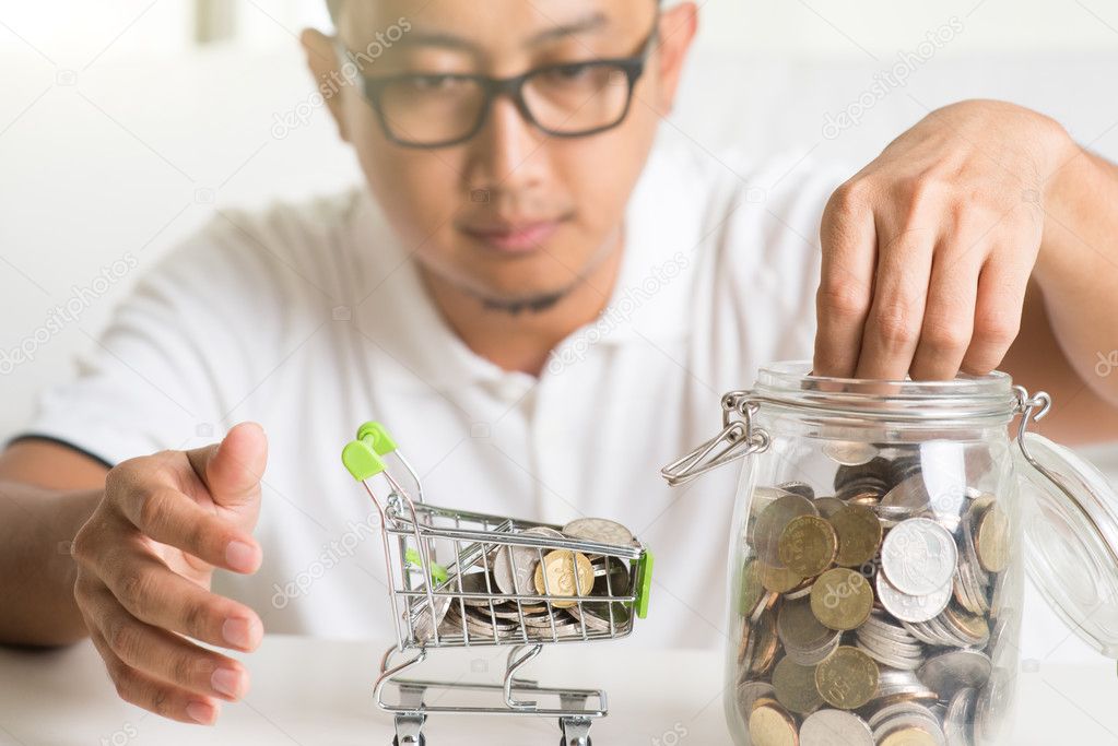 asian male saving money