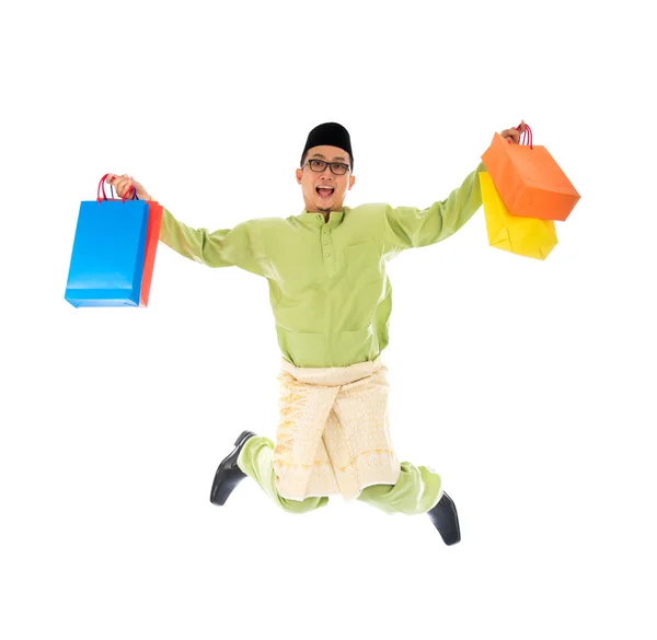 Traditional Malay male shopping — Stock Photo, Image