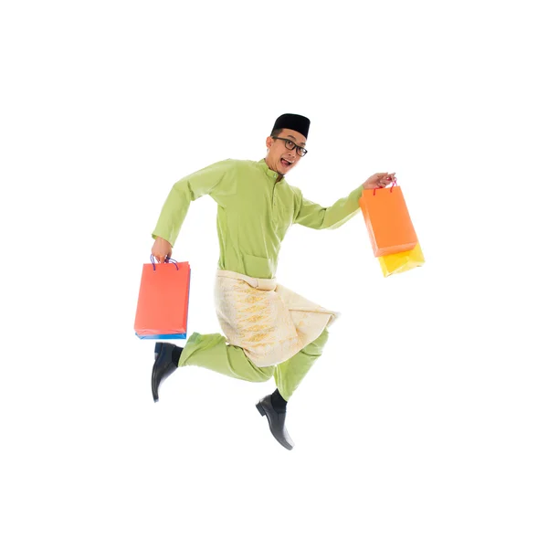 Traditional Malay male shopping — Stock Photo, Image