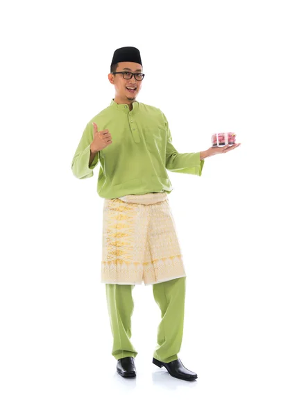 Malajski-mężczyzna z raya cookie — Zdjęcie stockowe