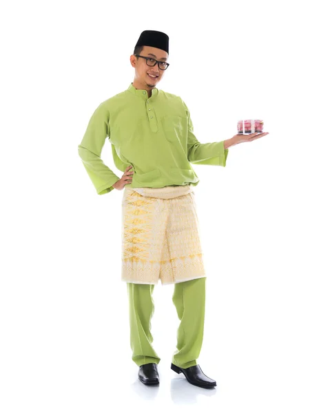 Malay male with raya cookie — Stock Photo, Image