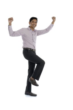 heyecanlı Hintli işadamı sevinç için atlama.