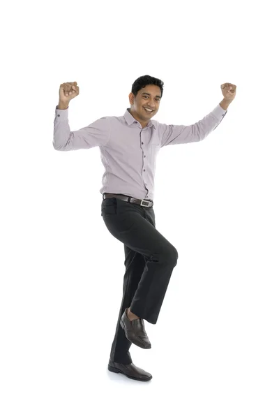 Excited Indian businessman jumping for joy. — Stock Photo, Image