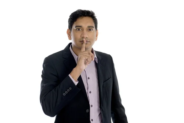 Hombre de negocios indio con signo silencioso — Foto de Stock