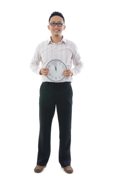 Asian business man holding a clock — Stock Photo, Image