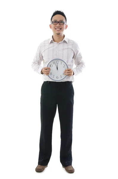 Asian business man holding a clock — Stock Photo, Image
