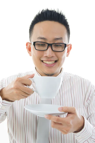 Asian businessman having a coffee — Stock Photo, Image
