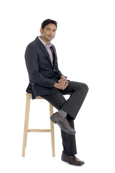 Indian business man sitting — Stock Photo, Image