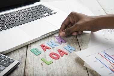 Wood letters as Bank Loan word
