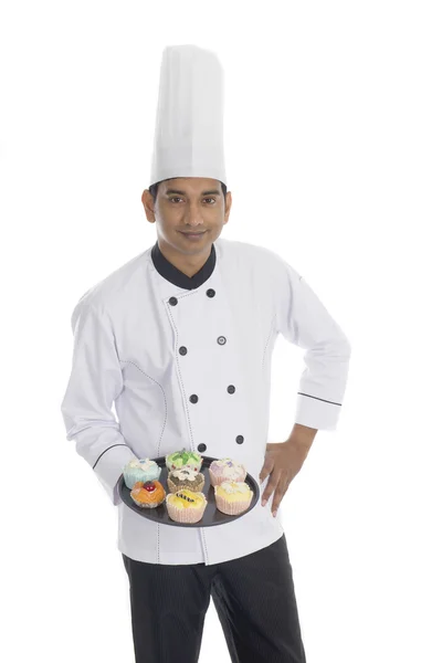 Indian male chef with cupcakes — Stock Photo, Image