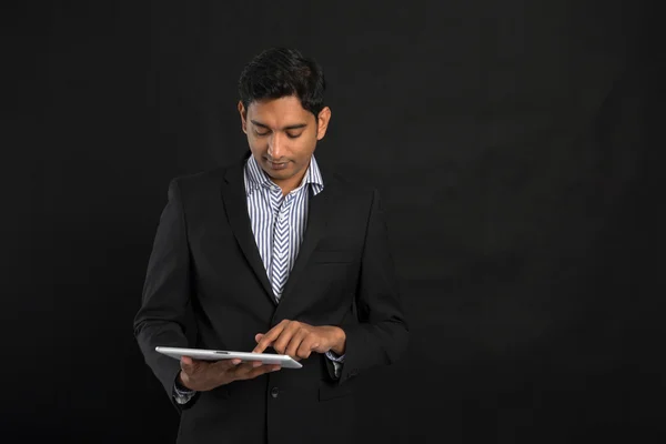 Indian business man with a tablet — Stock Photo, Image