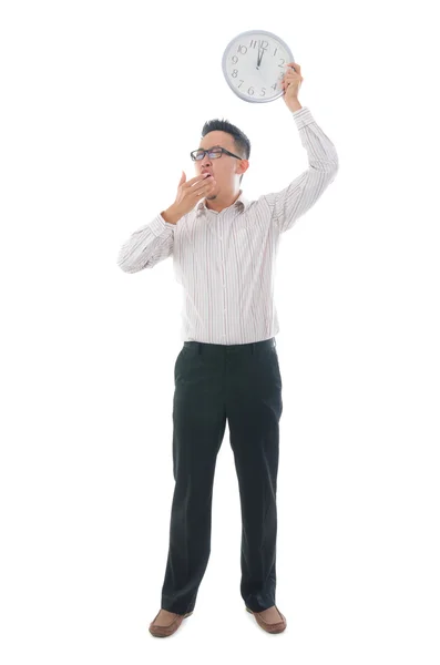 Asian business man holding a clock — Stock Photo, Image