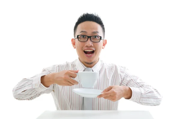 Asian business man drinking coffee — Stock Photo, Image