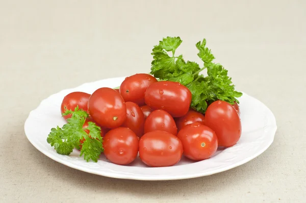 Organic tomatoes and parsley — Stock Photo, Image