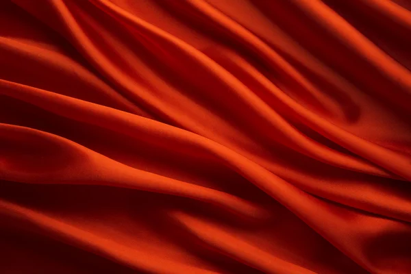 Fond en tissu de soie, Texture ondulée en tissu de satin rouge — Photo