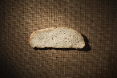 Ekmek dilimi parça çuval bezi kumaş, çadır bezi eyerin arka kaşı yemek üzerinden