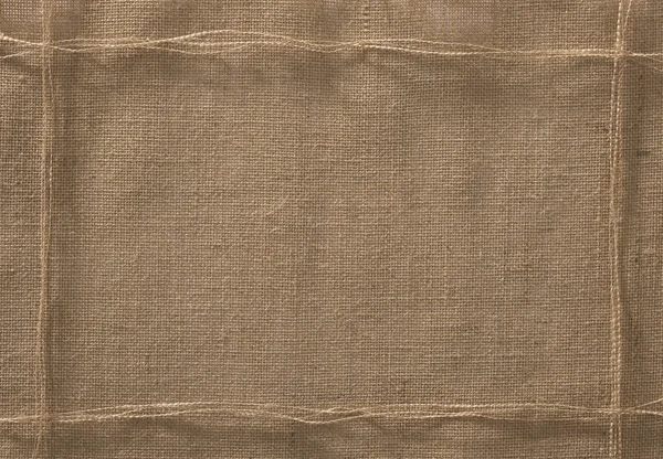 Λινάτσα ύφασμα φόντο πλαισίου, σακί πανί σχοινί χνούδια νήμα — Φωτογραφία Αρχείου