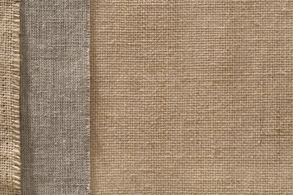 Burlap tecido saco pano borda fundo, textura de pano de saco — Fotografia de Stock