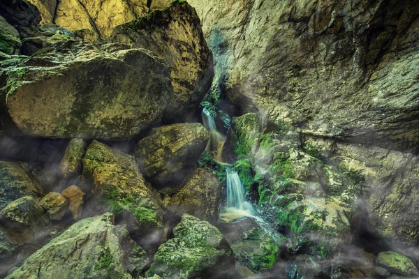 Underground river and waterfall — Stock Photo, Image