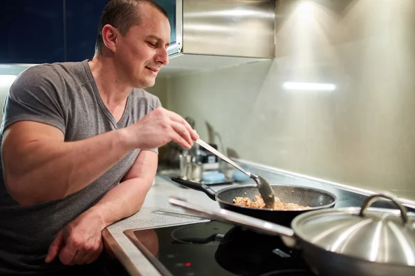 Man cooking  a thai recipe