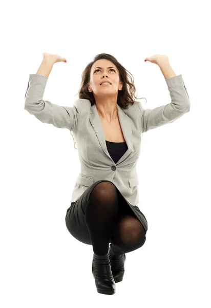 Businesswoman protecting herself from object — Stock Photo, Image