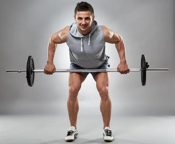 Man doing back workout — Stock Photo, Image