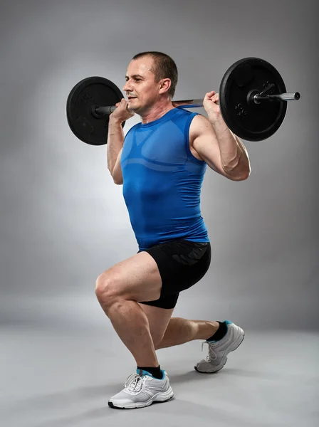 Homem fazendo lunges — Fotografia de Stock