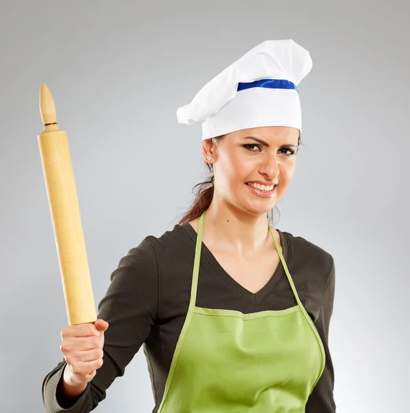 Vrouwelijke kok met een deegroller Rechtenvrije Stockafbeeldingen